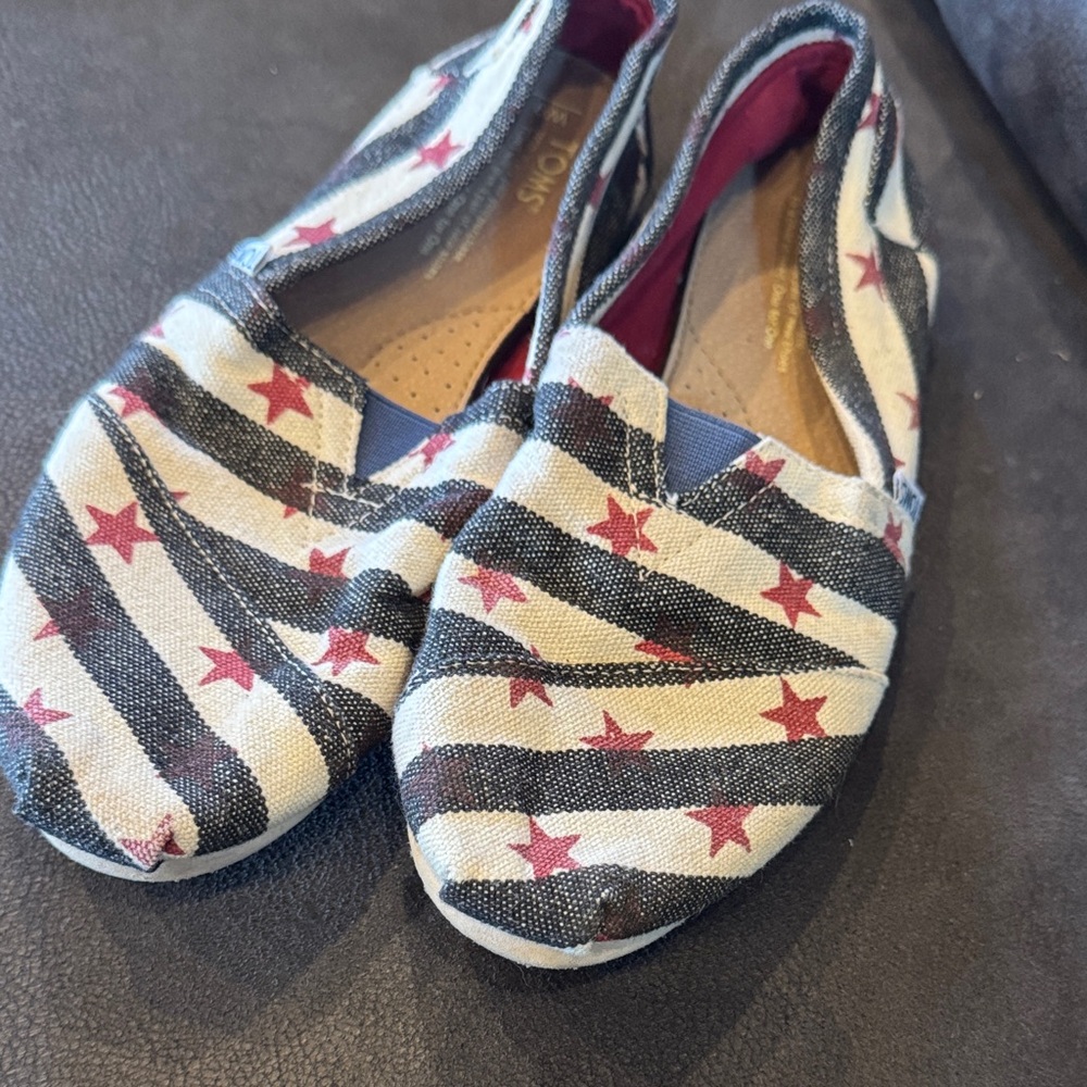 Toms Black and Red Slippers with Playful Design